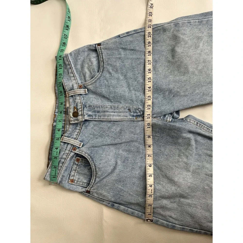Vintage 90s Levis 560 Loose Fit Tapered Leg Jeans 29x34 Made in USA Light Wash